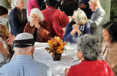 people gathering by the table